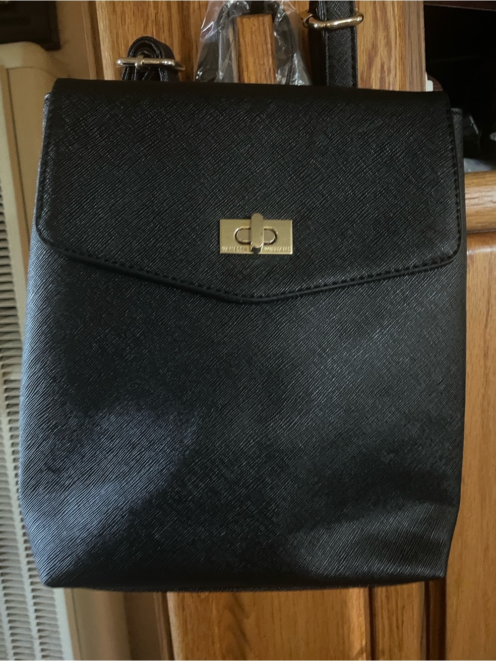 Structured Black Backpack with Gold Turn-Lock